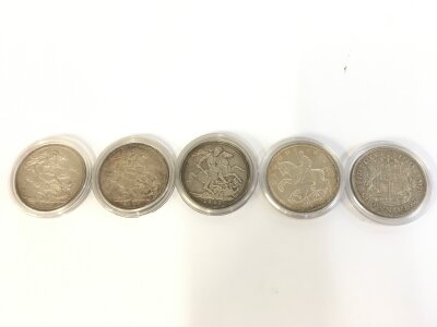 A collection of 5 crowns including three Victoria.