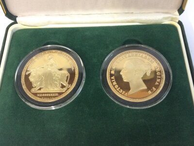 Two silver gilt Victoria copy coins.