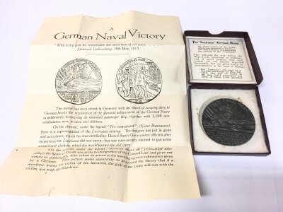 A Cased R.M.S Lusitania Coin.