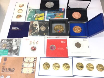 A Collection Of Commemorative Coin Sets.