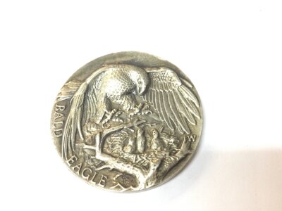 An American Silver Token Approximately Weighing 35g.
