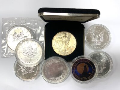 A collection of American and Canadian 1 OZ coins (2 Liberty 2018,  Canada Maple Leaf 1989/1995/1999/2012, Australia 2016, 1997 Eagle, 2017 Canada 3/4 OZ coin