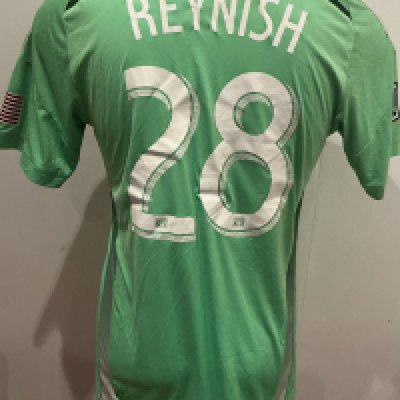 Chicago Fire 2014 - 2015 Match Worn Football Shirt: Green short sleeve number 28 with Reynish to rear and MLS badging to sleeve. Worn v Tottenham. Been washed but if you look close you can see some faint mud marks.