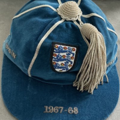 England 1968 Euros Full International Football Cap: Good condition blue cap awarded to World Cup winner Ray Wilson for playing in the 1968 Euro Championships. There were only 4 teams in the finals. This cap covers 2 matches v Soviet Union and Yugoslavia plus Spain who they played twice to qualify. Round the edge of the cap are the words Spain Spain Yugoslavia USSR. This was presented in a thick card box and Wilson has written to front and signed box. He has written the information of matches to front and the words last cap which in fact it was for the 1966 World Cup winner.