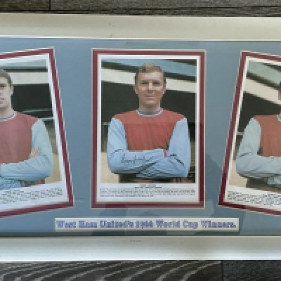 West Ham 1966 World Cup Winners Framed Cards: Replica large Typhoo Tea cards of Moore Hurst and Peters. Nicely framed and double mounted with claret and blue boards. Title states West Ham Uniteds 1966 World Cup Winners.