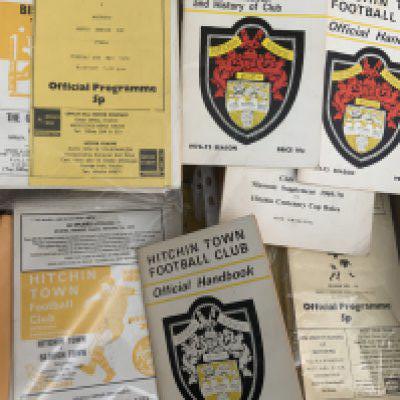 Hitchin Town Football Programmes: From 66/67 to 80/81 home and away with many finals and semis. Includes East Anglian Cup, Herts Senior Cup, Herts Charity Cup with some seasons complete. C/W some 1970s handbooks. (375)