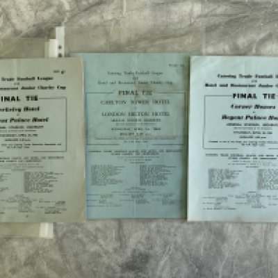 1960s Catering Trade Cup Final Football Programmes: Very rare programmes for matches played at Highbury. Officially named the Catering Trade Football League + Hotel and Restaurant Junior Charity Cup. Large blue programmes for 61/62 Berkeley Hotel v Regent Palace Hotel, 62/63 Corner Houses v Regent Palace Hotel and 63/64 Carlton Tower Hotel v London Hilton Hotel with slight marks. Good. (3)