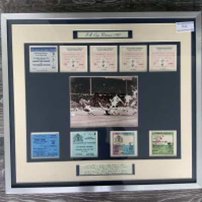 Tottenham 1981 FA Cup Final Framed Display: Picture of Ricky Villa scoring surrounded by a ticket from every round including the final and replay. We would guess that whilst behind glass the tickets look original and likely to be stuck down. Nice display 27 x 25 inches and is not for posting.