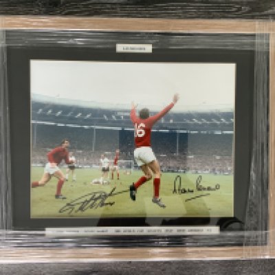 1966 England World Cup Winning Goal Scorers Signed Framed Photo: Large colour photo of Peters celebrating after scoring with Hurst which they have both signed. Measures 21 x 17 inches. Nicely framed and still in wrappers. Starting price is price of framing.