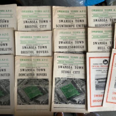 Swansea + Cardiff City Home Football Programmes: Swansea has 15 from 57/58 to 59/60 and approximately 90 from the 60s. Cardiff has 140 from the 60s plus some early 70s. Instructions to sell. Very good. (est 300)