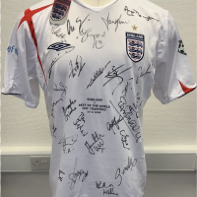 England + Rest Of The World 1st Ever Soccer Aid Signed Football Shirts: Incredibly rare match prepared shirts for both teams in the first ever Soccer Aid in 2006. Unused with labels attached sent back to Umbro as a thank you for supplying both kits for free. Shirts never available for sale so no price label on tags. 26 genuine autographs on England shirt with 23 on Rest Of The World shirt. Autographs include Robbie Williams Angus Deayton Ben Shepherd David Seaman Terry Venables Gazza Les Ferdinand and Gordon Ramsey. (2)
