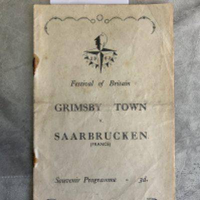 50/51 Grimsby v Saarbrucken Football Programme: Fair condition Festival of Britain programme with very rusty staples holding firm. No team changes. Fold.