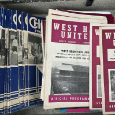Football Programme Boxes: 31 Chelsea homes from the late 60s, over 40 West Ham homes from the 60s and 70s to include 1966 League Cup final and 62/63 Plymouth LC plus over 80 Tottenham from the same period. There are plenty more including big match from the 50s to the 90s. (2 boxes)