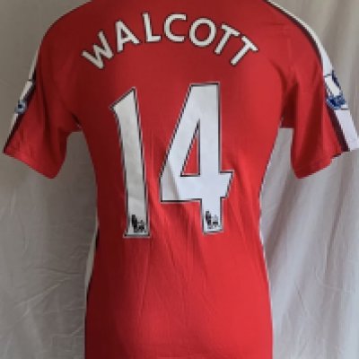 Arsenal 2009 - 2010 Match Issued Football Shirt: Short sleeve home Nike shirt issued to Walcott in size large. Good condition.