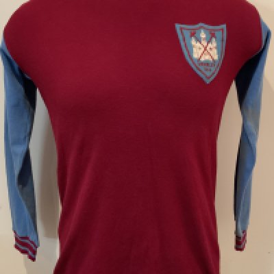 Ron Boyce West Ham Match Worn 1964 FA Cup Final Shirt: Bukta shirt in excellent condition worn in the final V Preston. Ron Boyce famously scored the winner to give West Ham their first FA Cup success. A truly iconic piece of West Ham history. COA will be supplied by the family of Boyce. Some slight staining to cuffs and sleeves of shirt.