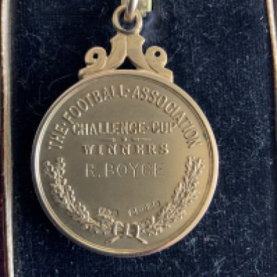 Ron Boyce West Ham 1964 FA Cup Final Winners Medal: Gold 9 Carat medal which is engraved to rear Challenge Cup Winners and also has R Boyce engraving added to rear. Comes in original Fatiorini Box. Boyce scored the late winner in the 3-2 win over Preston. Excellent condition. COA from family of Boyce supplied.