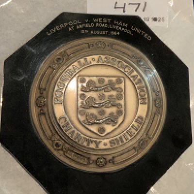 Ron Boyce West Ham 1964 Charity Shield Plaque: Five inch tall plaque engraved with match details of the 1964 Charity Shield match played at Anfield v Liverpool. The match finished 2-2 with both teams subsequently sharing the trophy. Excellent condition.