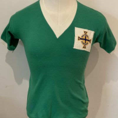 Northern Ireland Schools Match Worn Football Shirt: Green number 10 Umbro shirt was worn by K Wilson of Larne after the Victory Shield match at Vicarage Road on 5 April 1957 which England won 3-0. Excellent condition shirt swapped with Ron Boyce of West Ham.