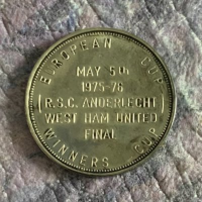 Ron Boyce West Ham 1976 European Cup Winners Cup Gifted Medal: Awarded by Anderlecht to Boyce. Medal has Anderlecht 1975 1976 to one side and is engraved with match details to the other. Rare one and a half inch medal in good condition given by Anderlecht to West Ham players and staff.