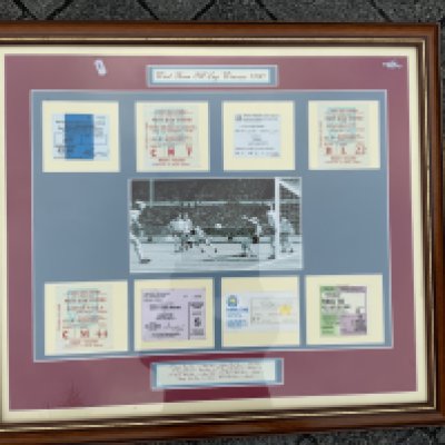 1980 West Ham FA Cup Ticket Framed Display: All 8 replica tickets from the 8 matches played in the full cup winning run. Includes both semi finals v Everton and both 3rd round matches v West Brom. C/W picture of the winning goal v Arsenal. Measures approx 30 x 27 inches. Not for posting.