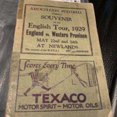 1929 English FA Tour To South Africa Guide Book: 22 page guide listing fixtures and English players touring etc. Back page has strip missing not affecting any text. There is tape also. Unusual item with instructions to sell.