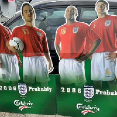 England 2006 World Cup Advertising Display: Large Carlsberg advertising display of players measures approx 68 x 56 inches. Features players Beckham Cole Gerrard and Defoe.