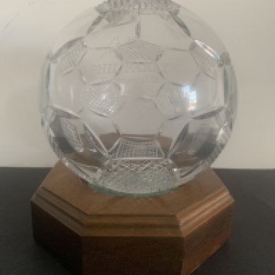 1990 Phil Parkes West Ham v Ipswich Testimonial Gift: Glass ball on wooden base given to then Ipswich manager John Lyall. The ball has been etched with the details of the match. C/W a photo of them both that John kept.