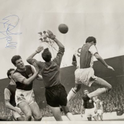 John Lyalls Early West Ham Family Scrapbook: Compiled by his wife Yvonne and includes signed photos of John. Programmes include 16 programmes from 60/61 and an away complimentary ticket at double winners Tottenham all stuck down to scrapbook.
