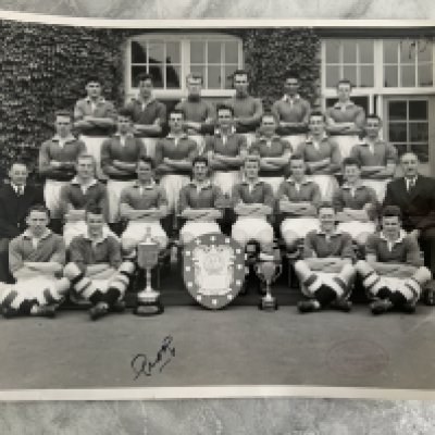 Chelsea 1955 Champions Team Group Press Photo: Almost 12 x 10 inches taken at the beginning of the 55/56 season with 3 cups present in front of 23 players plus management. The front has press stamp and word prog which meant this was the photograph used for the programme.