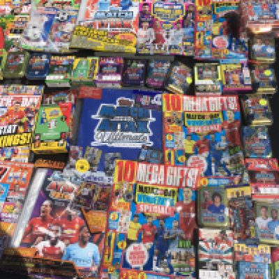 Match Attax Sealed Football Card Collection: Around 40 sealed metal tins or sealed packs housed in cardboard from a modern era with a minimum of 7 pounds paid each per pack. Numerous magazines with free packs to encourage collecting plus some sealed empty albums and packs. Very large quantity which must have cost nearly 500 pounds when new.