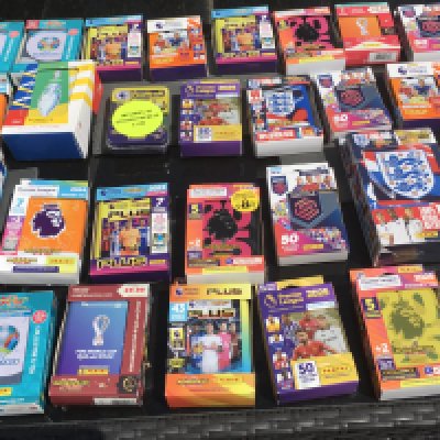 Panini Sealed Football Card Collection: Around 30 sealed metal tins or sealed packs housed in cardboard from a modern era with a minimum of 8 pounds paid each per pack. Numerous magazines with free packs to encourage collecting plus some sealed empty albums and packs. Very large quantity which must have cost around 400 pounds when new.