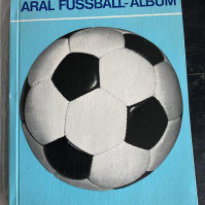 1966 World Cup Signed Football Card Album: Aral Fussball Weltmeisterschaft 1966 album. Not only signed by all 26 German players but also by the other 10 big names in the World Cup which include Bobby Moore Bobby Charlton Pele and Eusebio. If you are familiar with this rare set you will know that there is a line up picture of both teams in the final which is signed by hat trick goalscorer Geoff Hurst. Stunning genuine signed album.