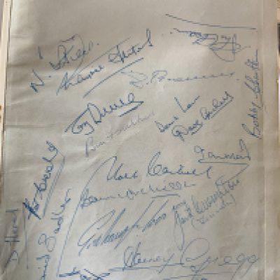 1964 Manchester United Signed Football Book: Boys Book Of Soccer Annual signed by 20 including Charlton Law Stiles Crerand Gregg Sadler Setters Cantwell Foulkes and more. Picture of the recipient who had health issues and newspaper cutting regarding this book. C/W signed Denis Law book without dust jacket. (2)