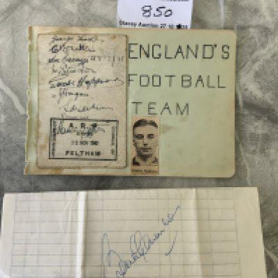1941 England Football Autographs: Autograph page with 8 signatures stuck down to include Hapgood Matthews Hagan Edelston Bacuzzi and Brittany. C/W Bobby Charltons autograph on a page collected in 1970.