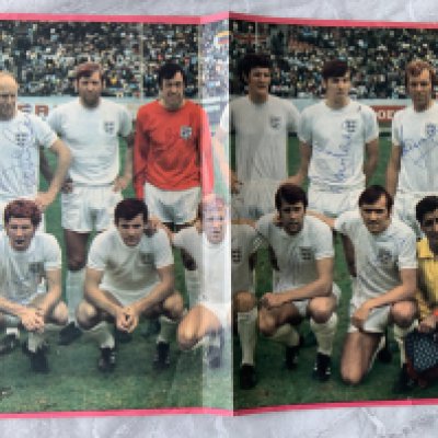 England 1970 World Cup Signed Football Team Group: Large double page colourful magazine picture of 11 players of which Moore Peters Hurst B Charlton Banks Ball and Cooper have all signed. C/W full size magazine picture of 5 England legends signed by Flowers Haynes McNeil and Swan.