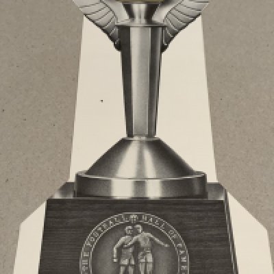 Hall of Fame Signed Football Dinner Menu: 2002 menu in the shape of the trophy from the first Hall of Fame awards presentation. Alf Ramsey Matt Busby Stanley Rous Bobby Charlton Tom Finney and Tommy Trinder are among the signatories. Over twenty signatures. Good condition.