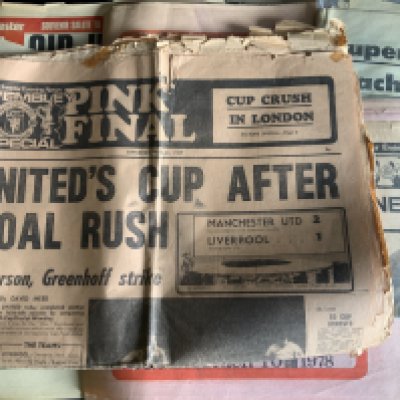 Manchester United Football Newspapers: Large box containing wide assortment with at least half featuring Man Utd in a few eras. (Box)