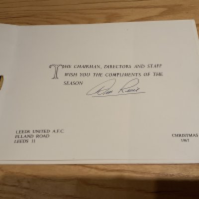 Don Revie Leeds United Signed Christmas Card: Leeds United with yellow and blue tassels from the Chaitman Directors and staff at Christmas 1967. Signed without dedication by Don Revie. COA from reputable source.