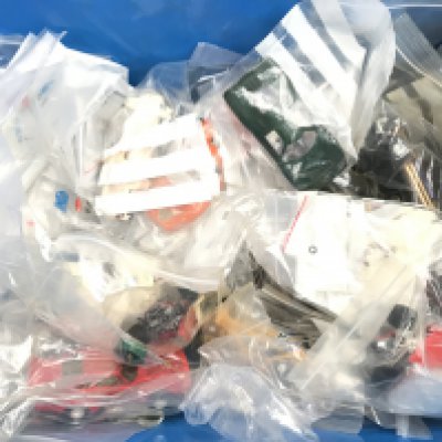 A Box Containing Scalextric Car Spare Parts.