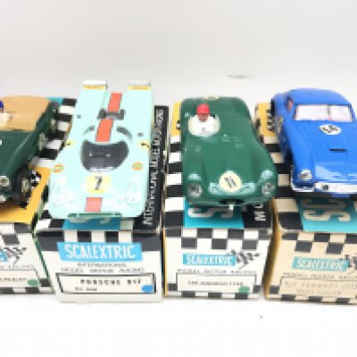 4 X Boxed Scalextric Cars. A Austin Healey (Repro Box) a Porsche 917 (Repro Box). A Jaguar D Type(Repro Box) and a Ferrari (GT) (Original Box).
