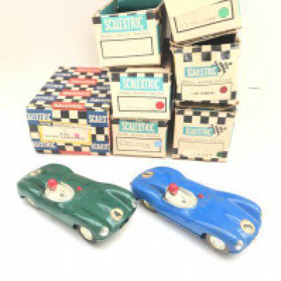 A Collection of Vimtage Scalextric Cars. Some Boxed. And Buildings.