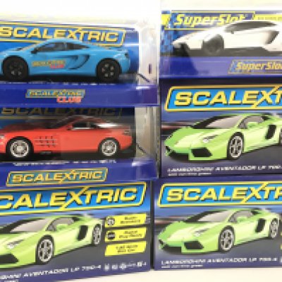 6 x Boxed Scalextric Cars. 4 Lamborghini Aventador LP 00-4. A McLaren MP4-12c and a Mercedes-Benz SLR McLaren.