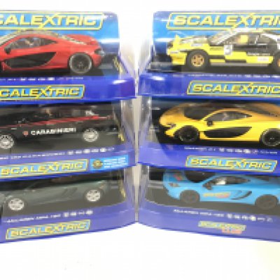 6 Boxed Scalextric Cars. 2 X McLaren MP4-12C. A Alfa Romeo 159 Carabinieri. 2 X McLaren P1. And a Ferrari 308 GTB.