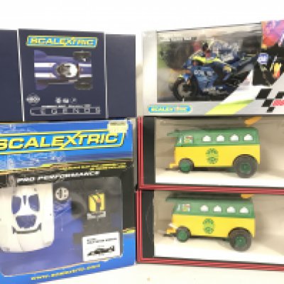5 X Boxed Scalextric Vehicles Including 2 X Turtle Party Wagons. A Valentino Rossi Yamaha. A Legends Maserati 250F and a Lola Aston Martin Assembly Kit.
