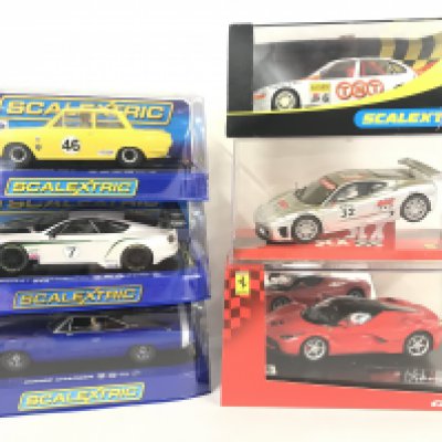 6 X Boxed Slot Cars including Scalextric. SCX and Carrera.