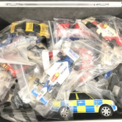 A Case containing Scalextric cars. Ideal for Spare Parts Etc.
