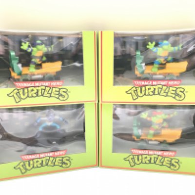 4 Boxed Scalextric Teenage Mutant Hero Turtles. Including Footsoldier. Donatello. leonardo and Raphael.