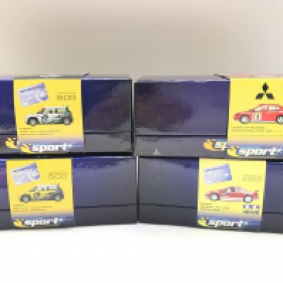 4 X Boxed Scalextric Sport Cars. 2X Minis. A Mitsubishi Lancer Evolution and a Peugeot 307 WRC.