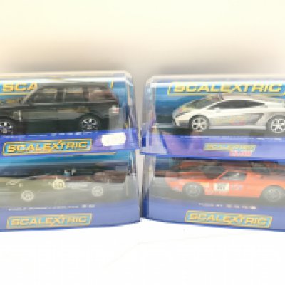4 X Boxed Scalextric Vehicles. Including a Range Rover. A Lamborghini Gallardo.a Eagle Gurney-Weslake and a Ford GT.