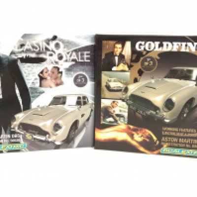 2 Boxed Scalextric James Bond Cars. Both Aston Martins D.B.5s from Casino Royal and Goldfinger.